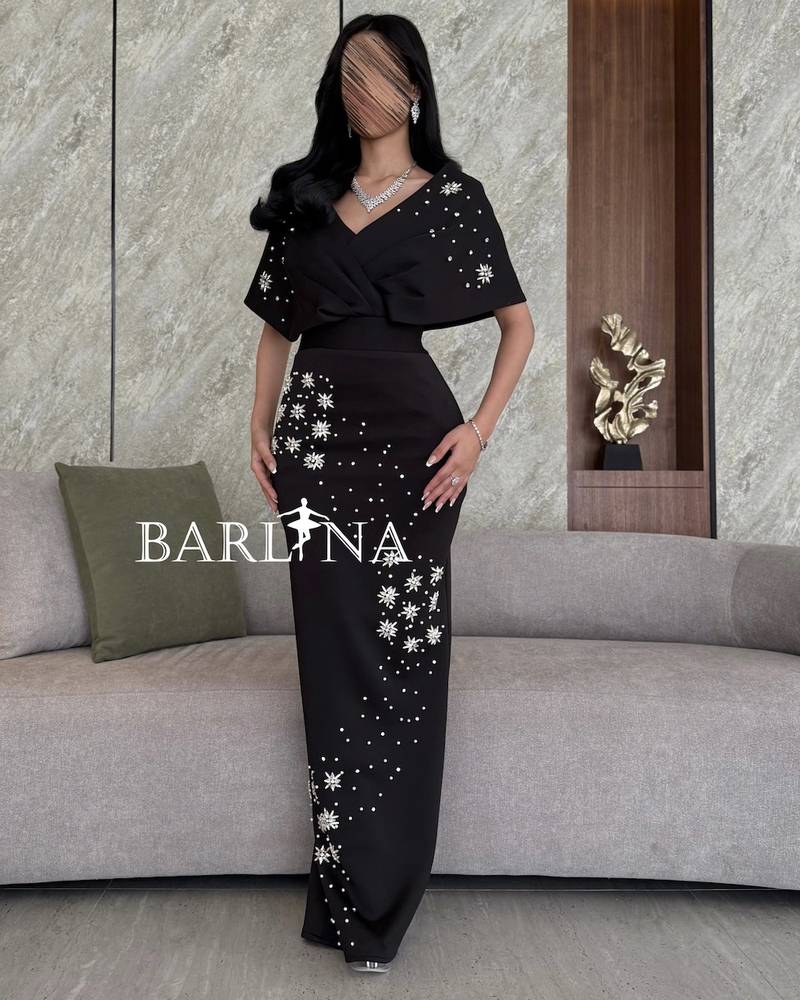Long black dress with wide shoulders