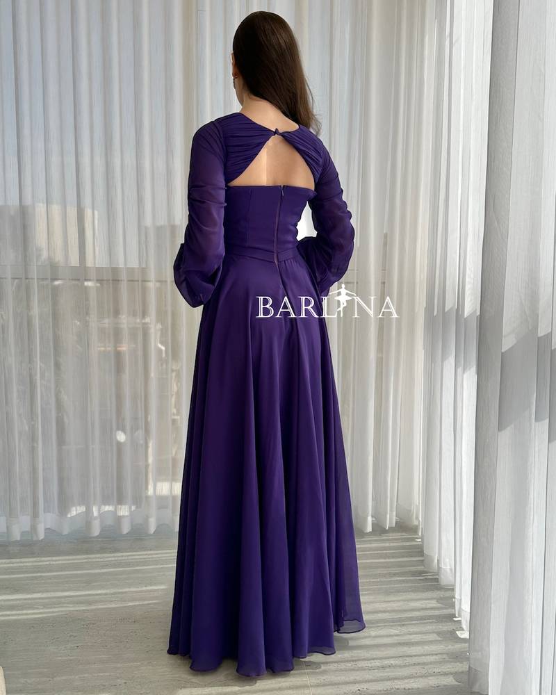 Royal purple dress with slit at the chest