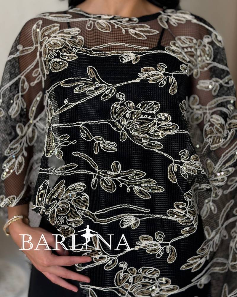 Elegant jumpsuit with a sheer embroidered panel