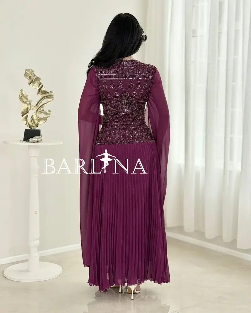 Dress with shimmering embroidery on the bodice