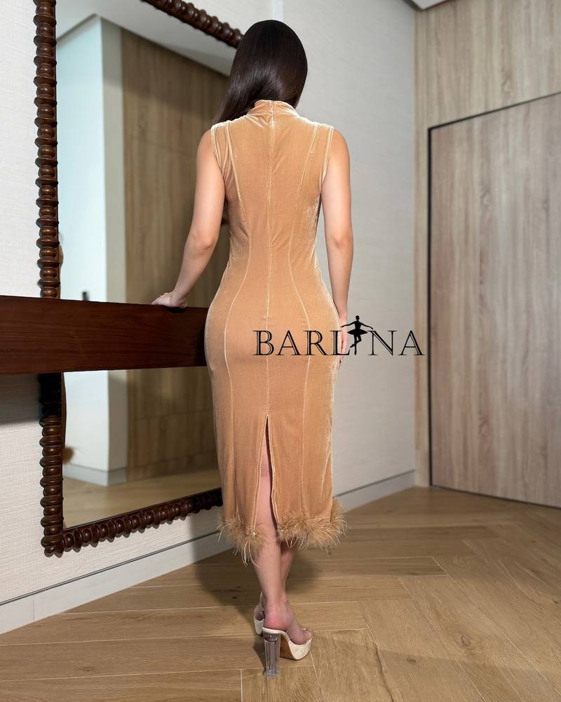 Velvet fitted dress with a feathered hem