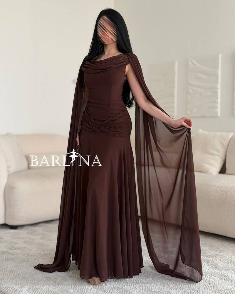 Brown dress with a long cape that drapes from the shoulders