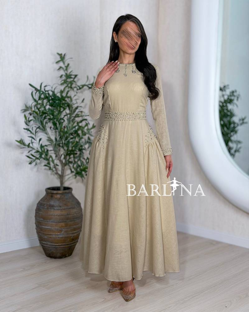 Long beige jalabiya with delicate beaded details