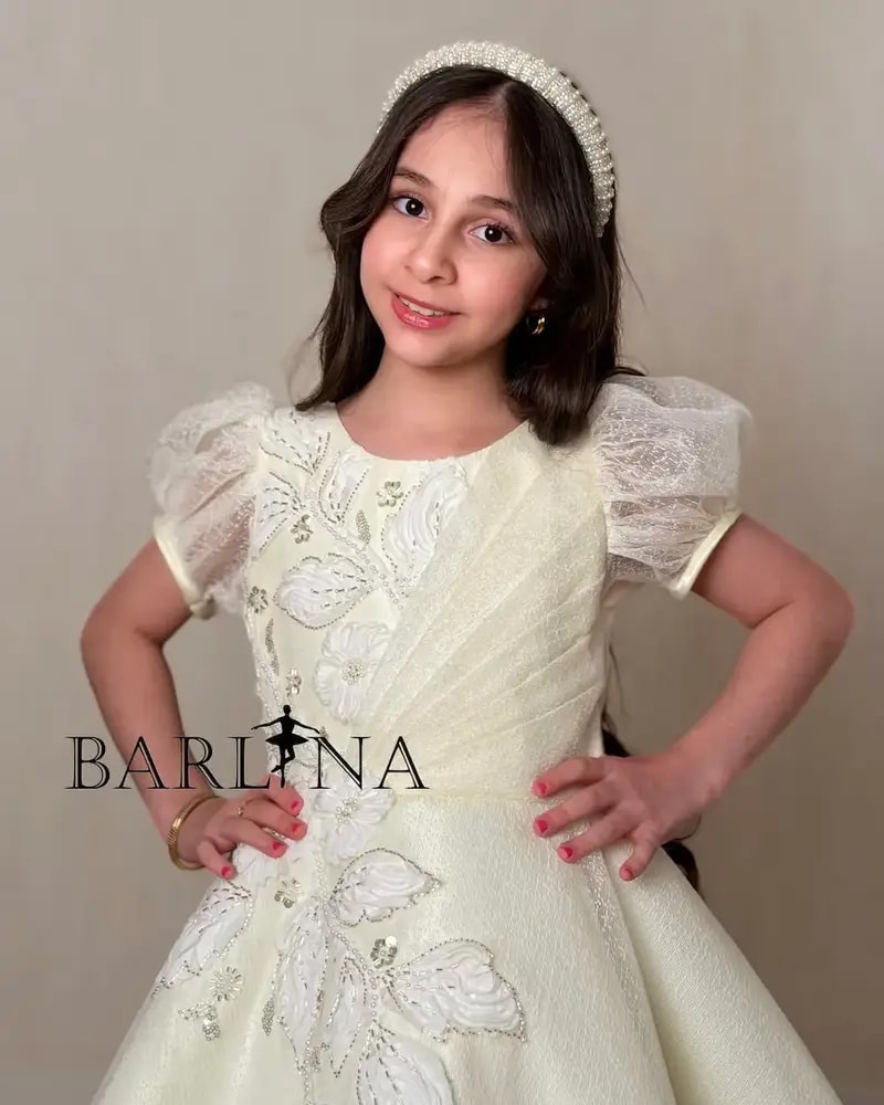 Lemon-colored girls' dress with elegant embroidery details