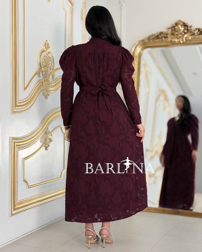 A soft burgundy dress with patterned fabric