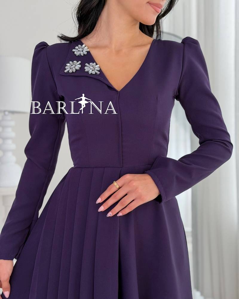 Purple dress with a V-neck and crystal embellishments