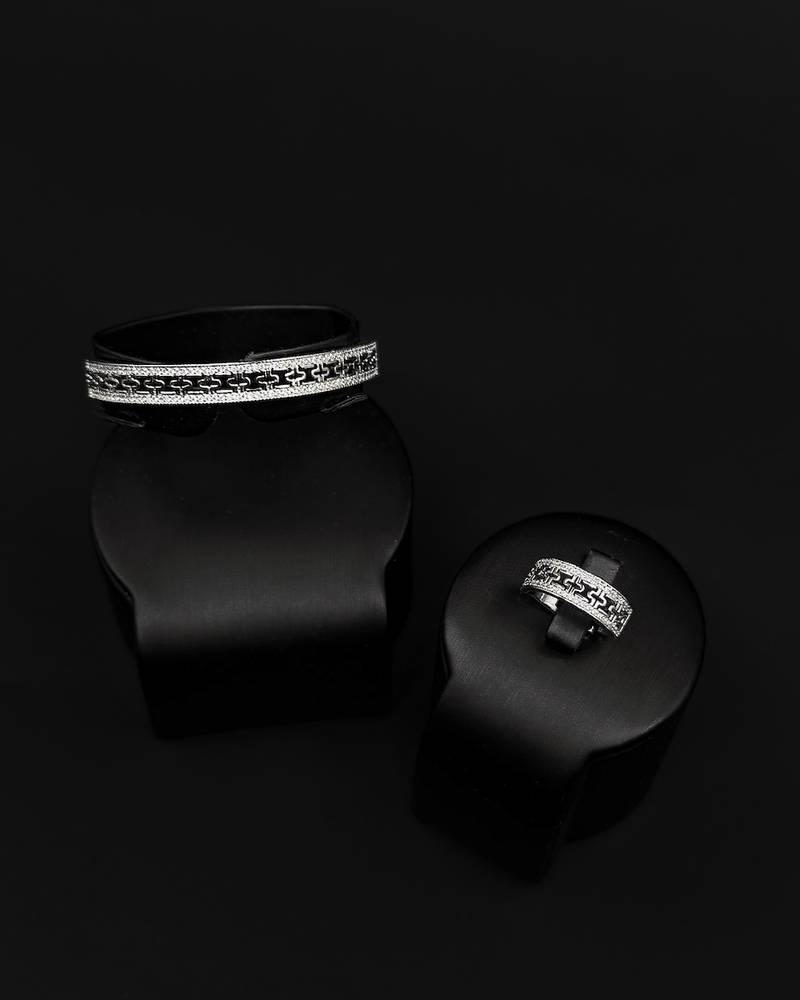 Bracelet and ring with a wide, flat design