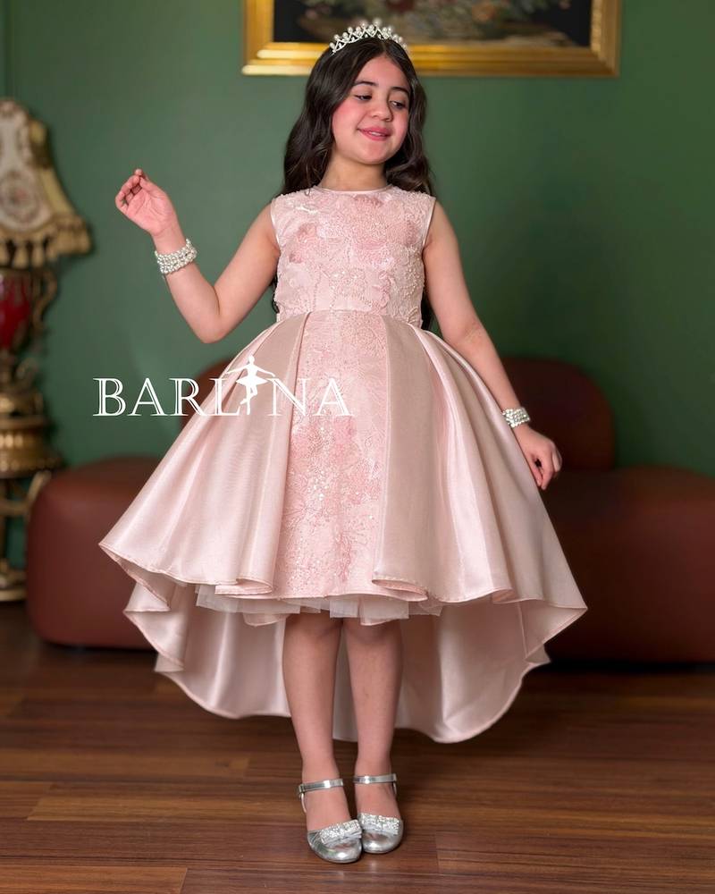 Pink girls' evening dress with a high-low cut