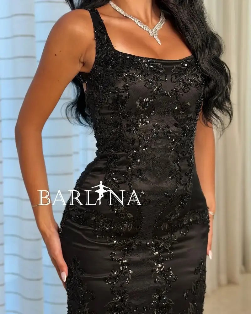 Black fully embroidered dress with a back cut-out