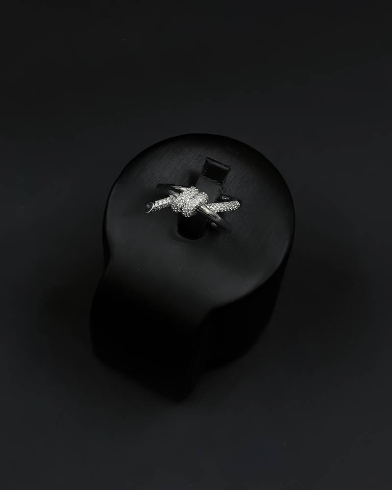 A delicate bracelet and ring with a wrap design