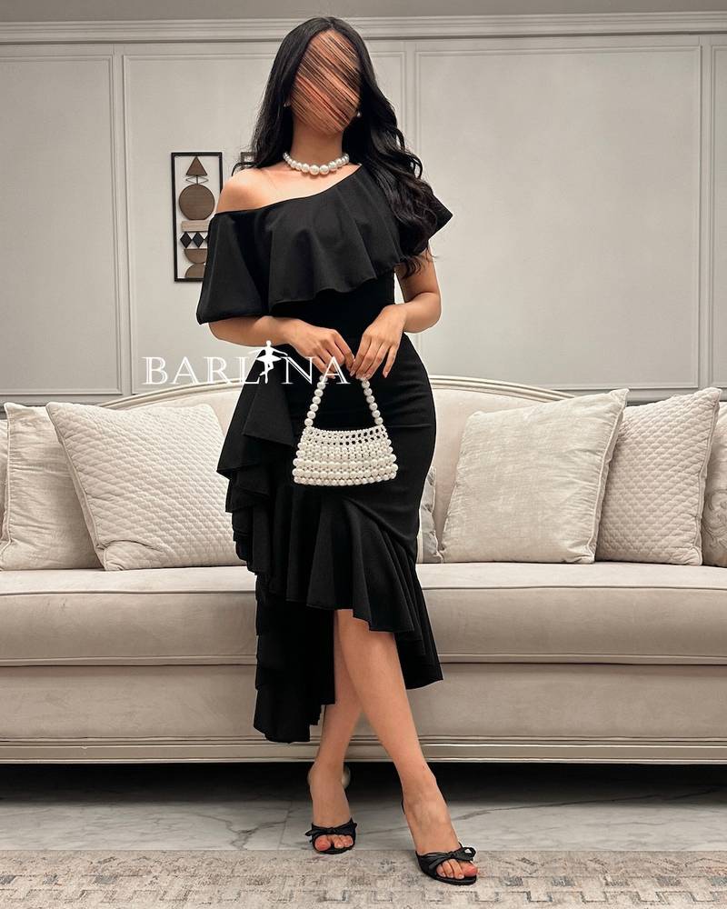 Black midi dress with side ruffle design