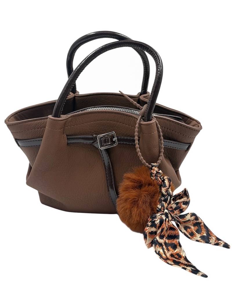 An elegant handbag adorned with a soft fur trim