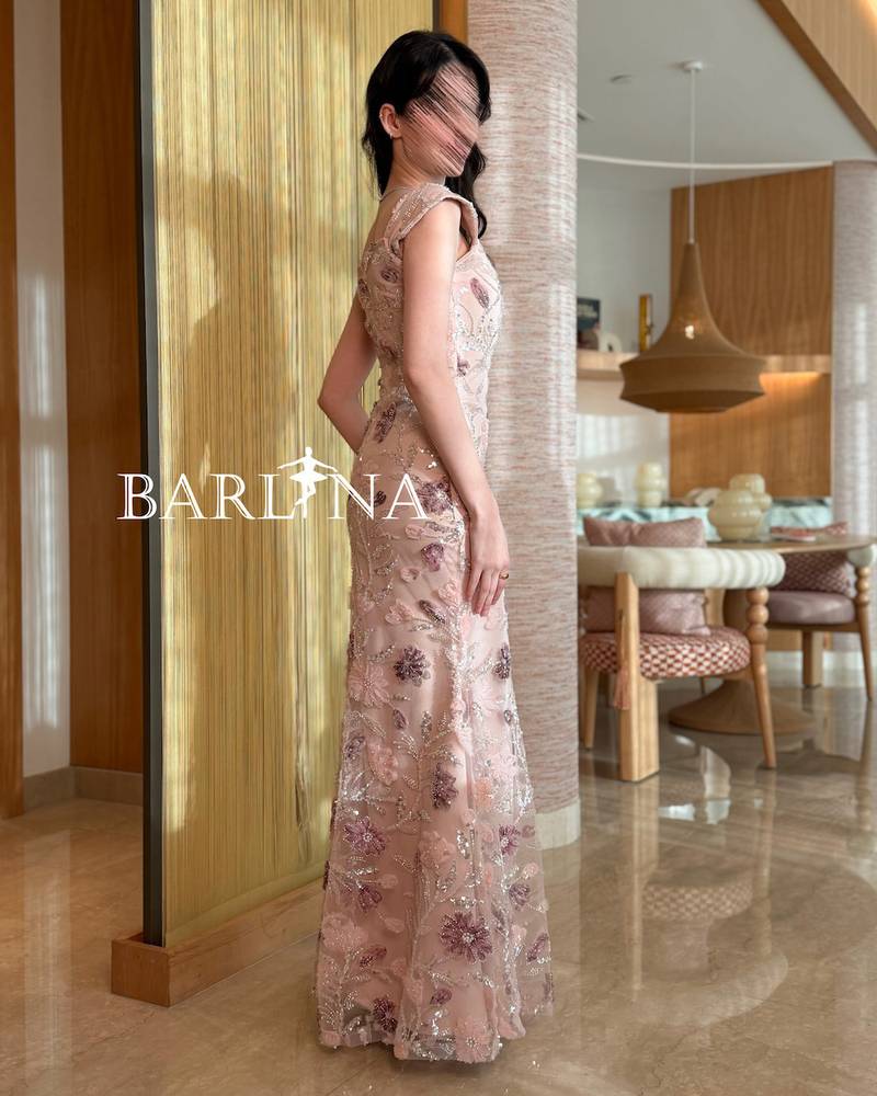 A pink dress with pink embroidery and elegant glitter