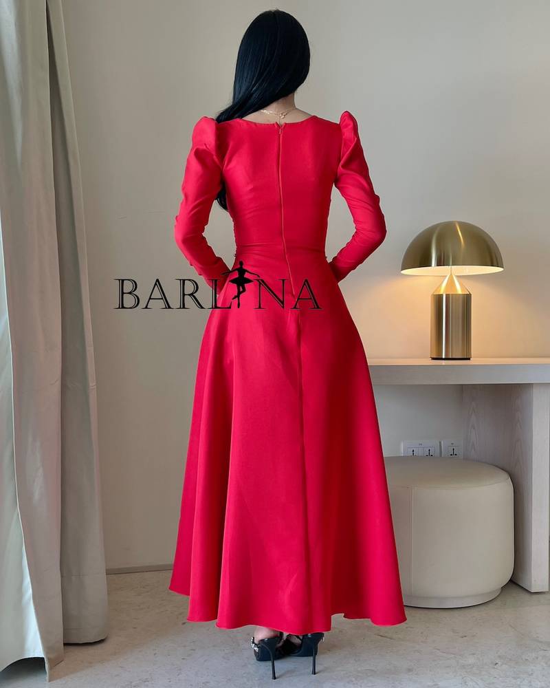 Classic red dress decorated with crystals with long sleeves