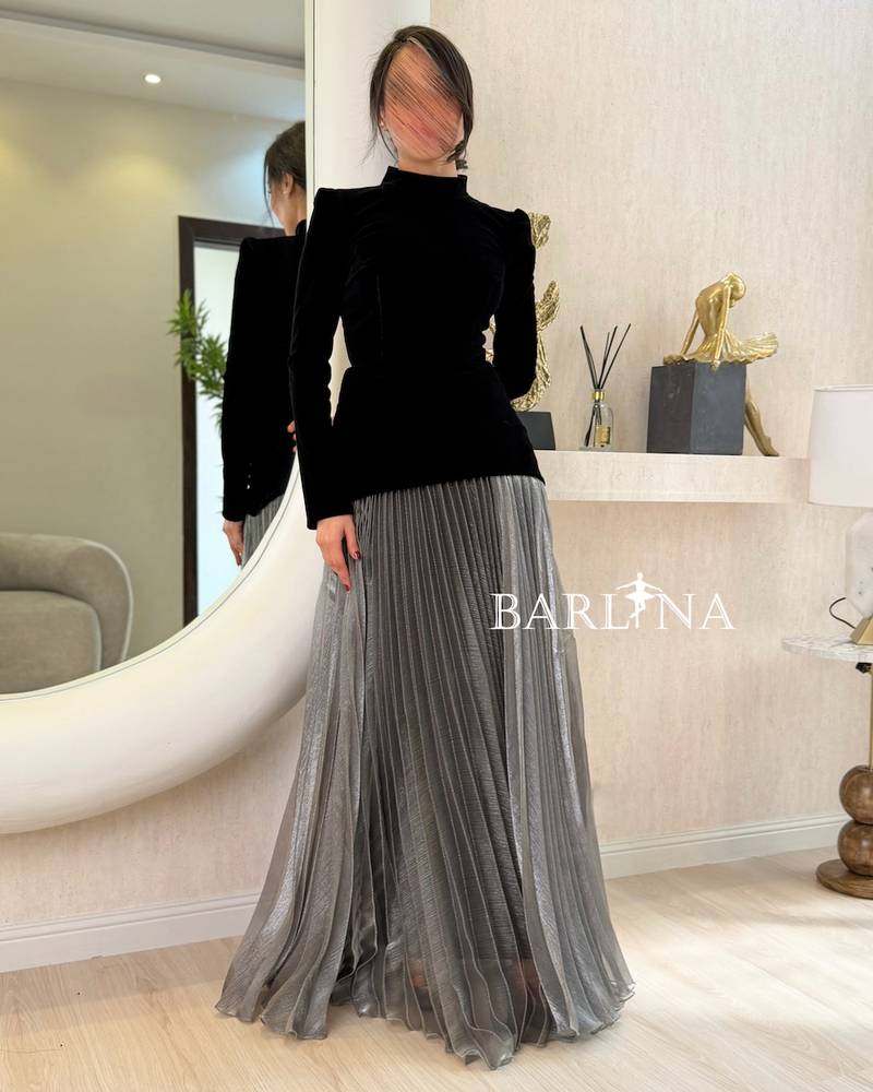 Black velvet dress with long silver pleats