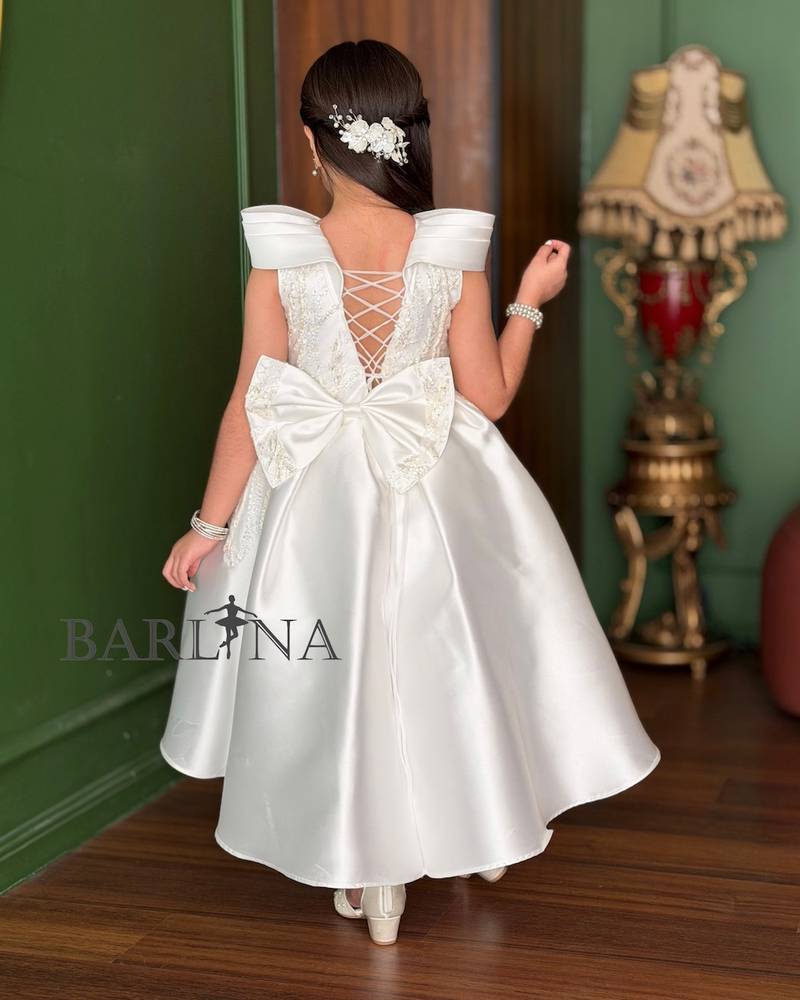 Girls’ white evening dress with a high-low design