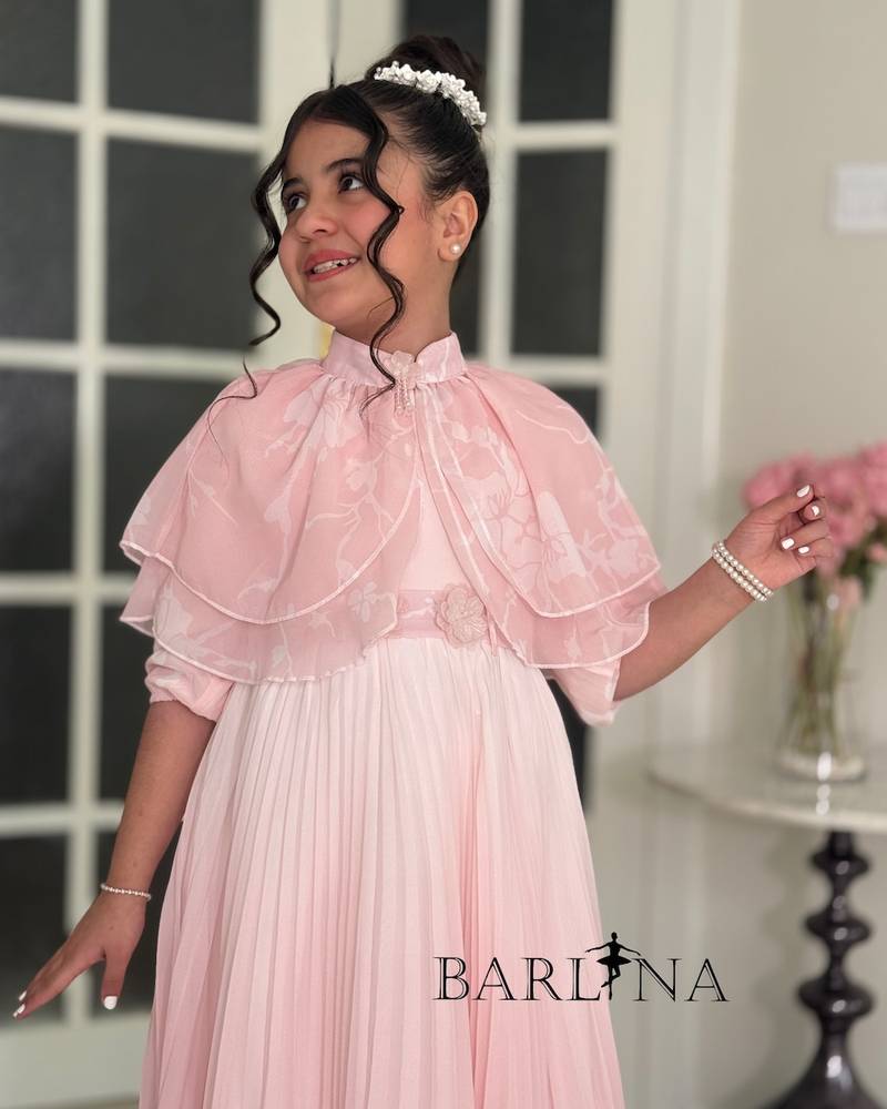 Girls' pleated dress with a floral overlay