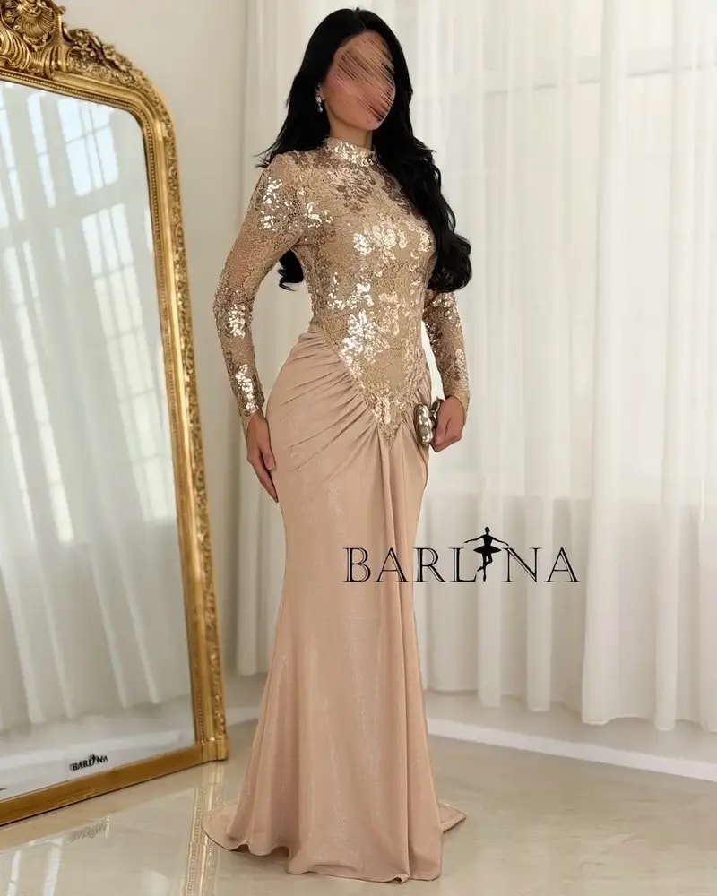 Evening dress adorned with embroidery and shimmering sequins