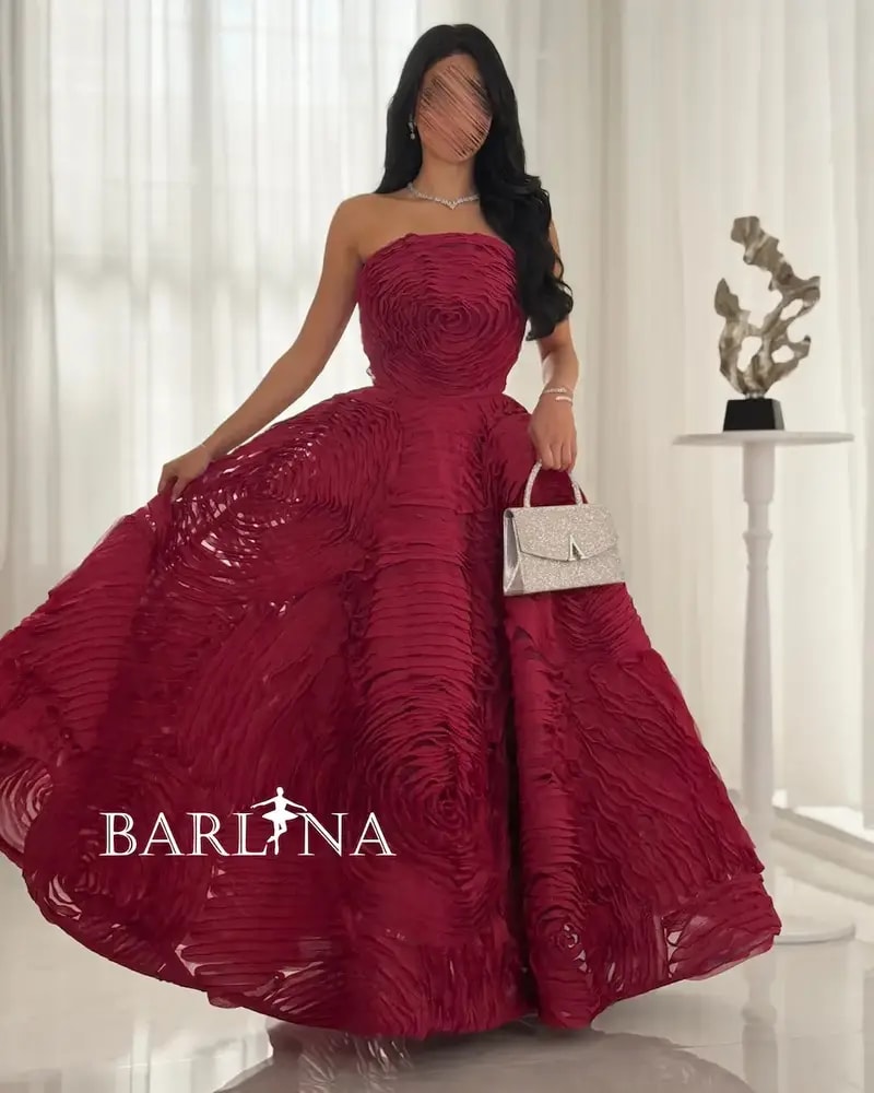 Red evening dress with 3D details