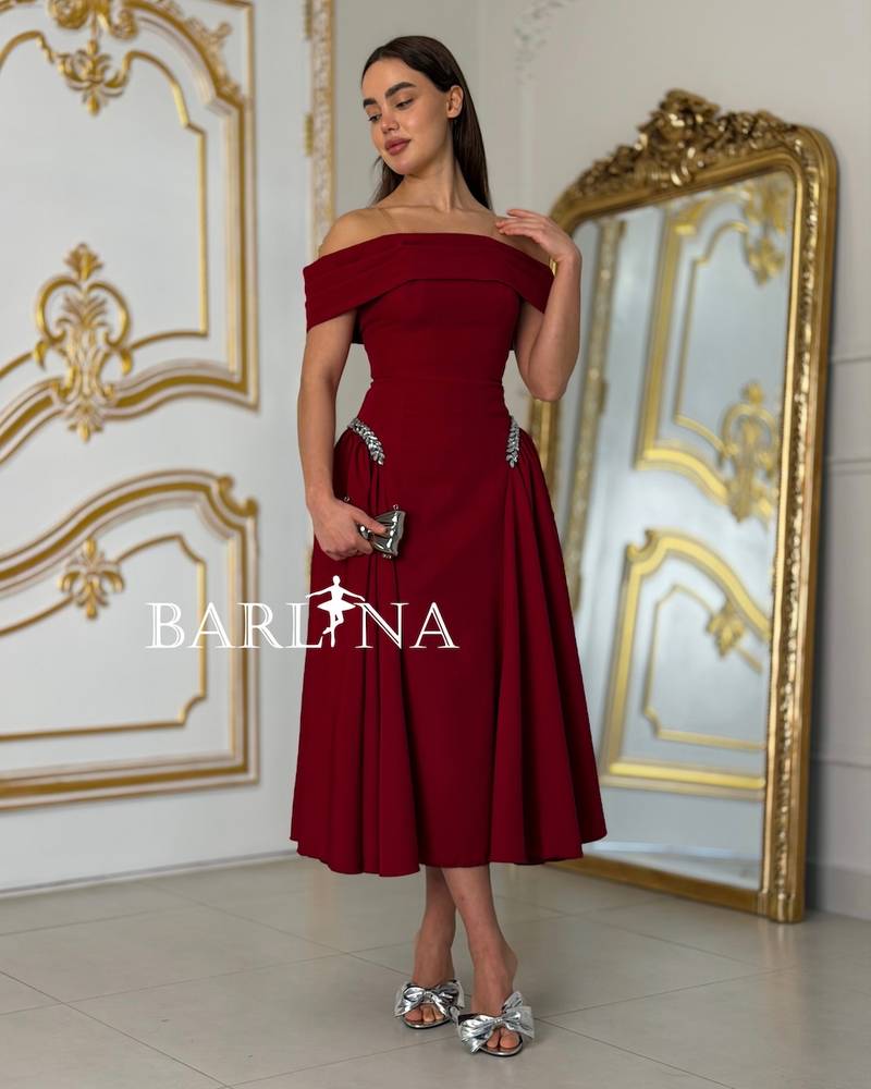Burgundy off-shoulder dress with a feminine cut