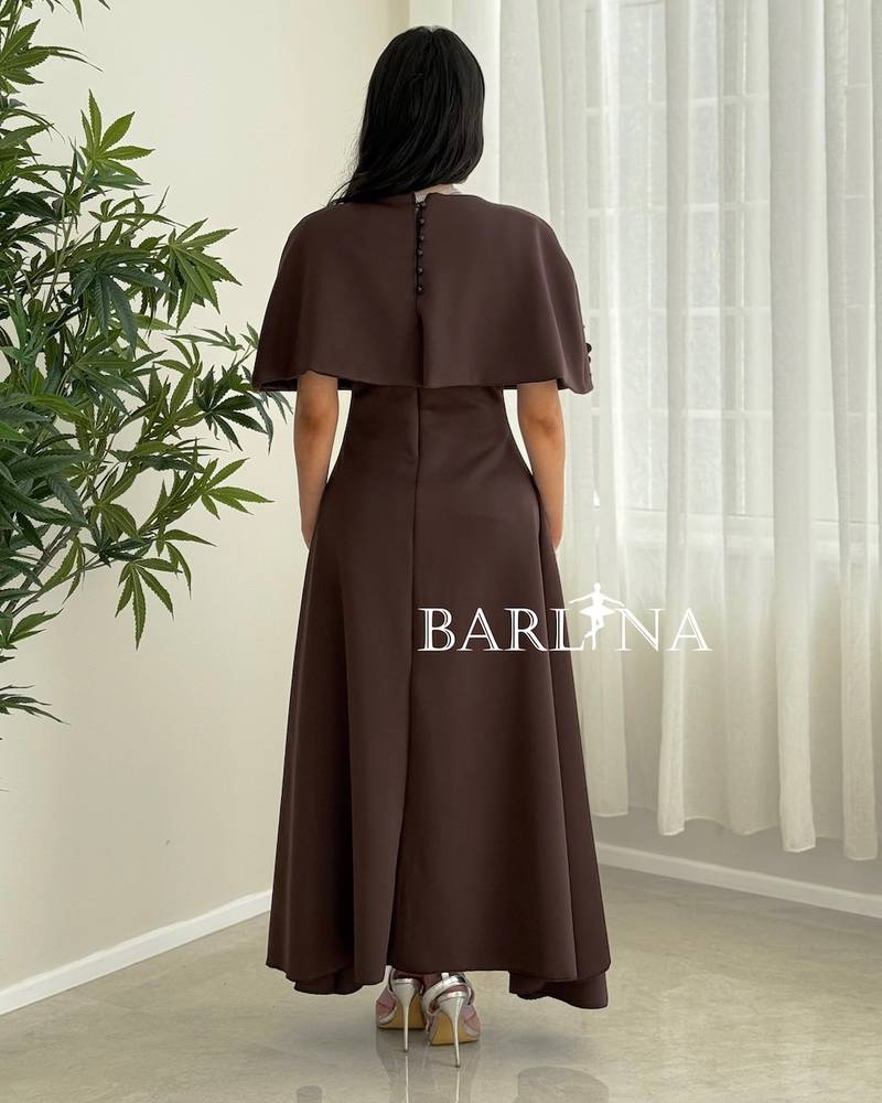 Elegant brown dress with a short cape top