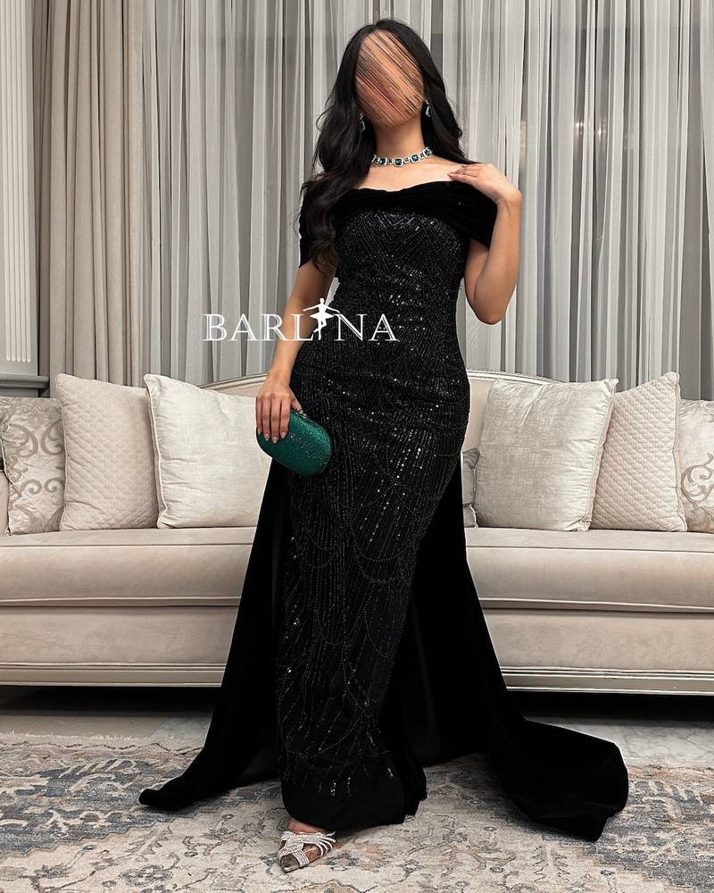 Black evening dress with shiny details