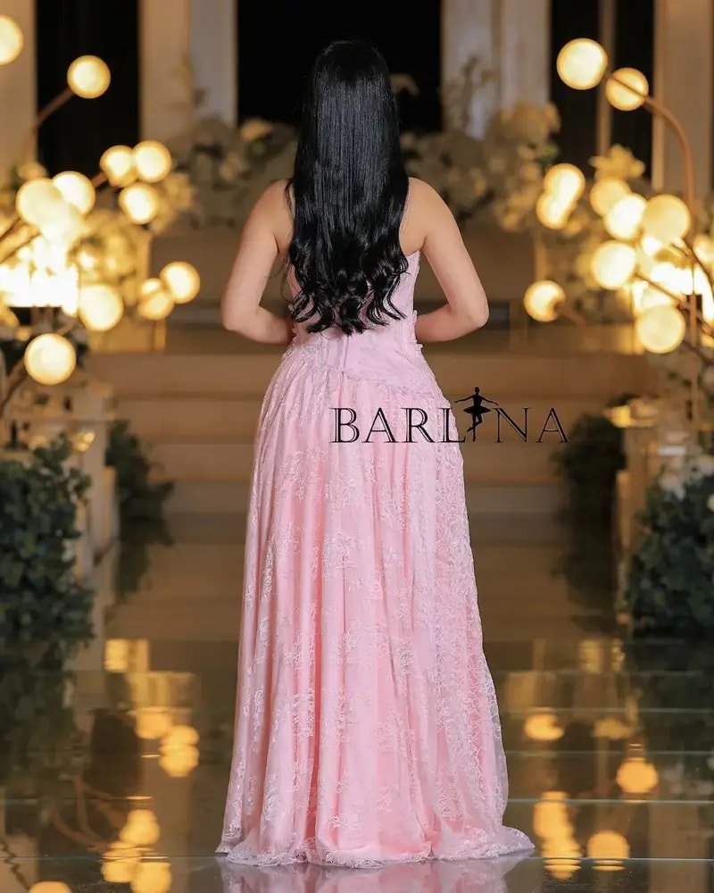 Pink evening dress embroidered with delicate lace