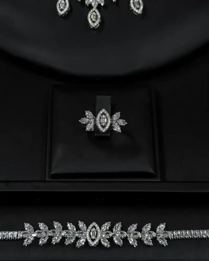 Crystal-studded accessory set with a dangling design