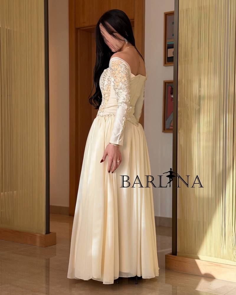Ivory wide dress with long embroidered sleeves