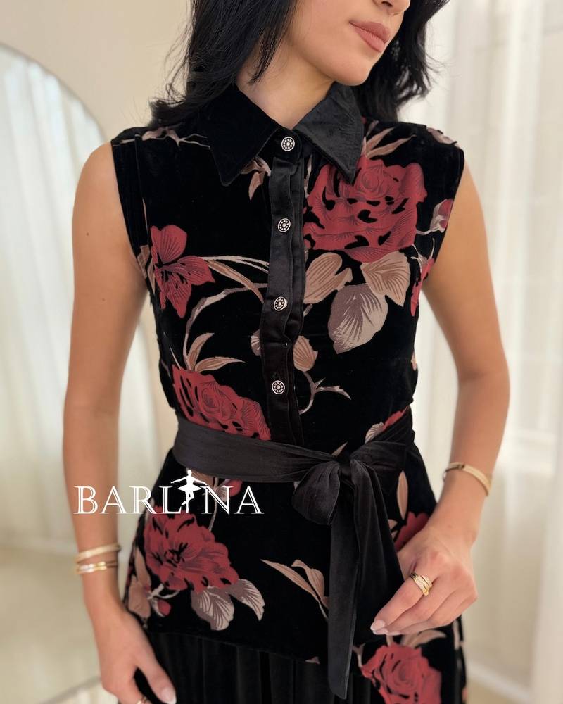 Black midi dress with a red floral print