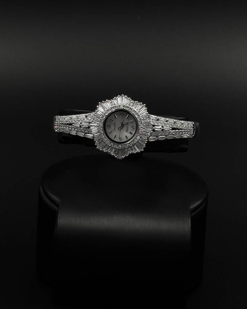 Uniquely designed watch studded with long stones