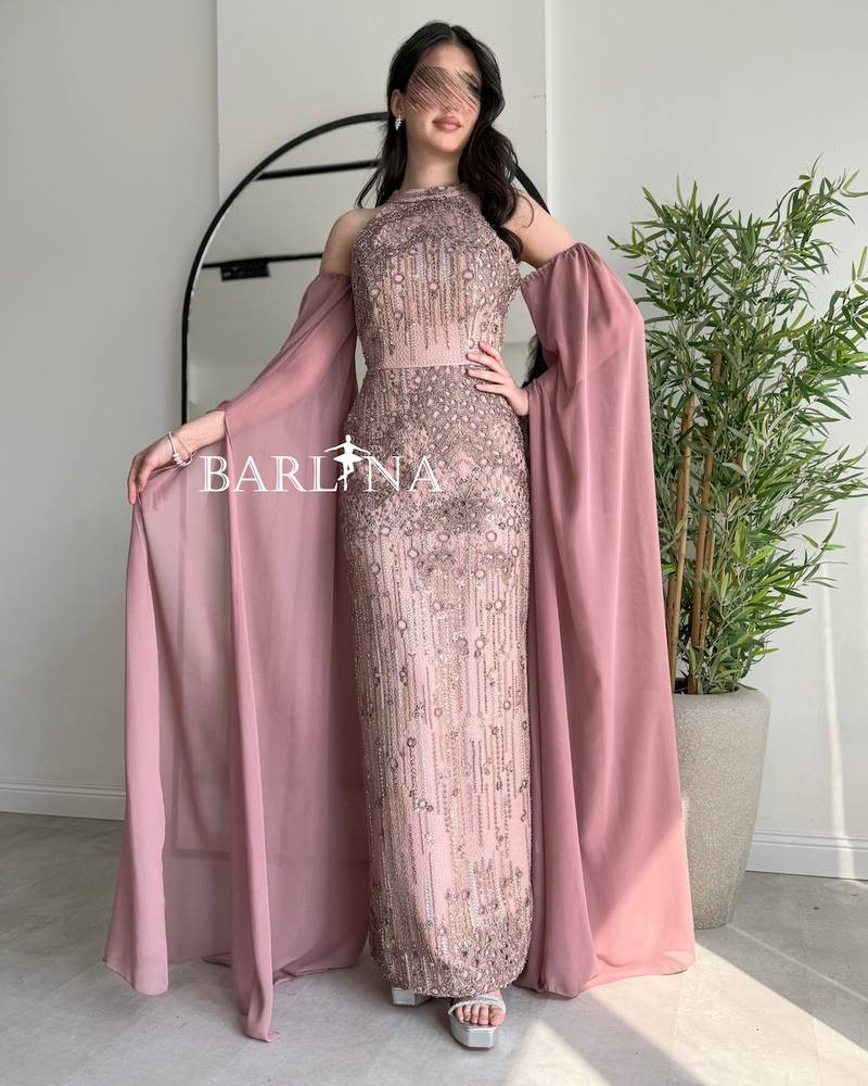 Nude dress with long off-shoulder sleeves