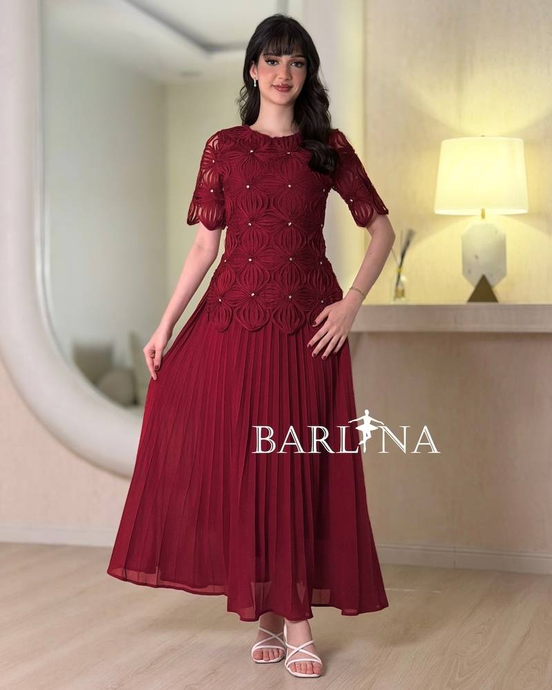 Soft pleated dress with embroidered bodice