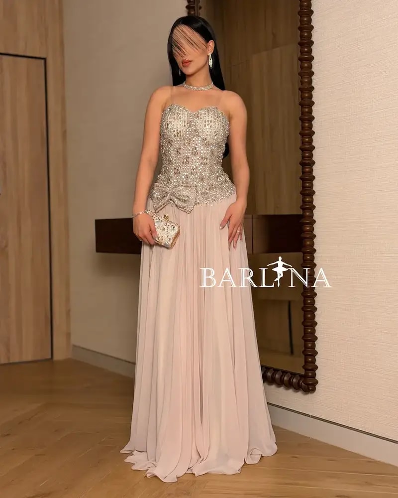 Beige evening dress adorned with crystal details