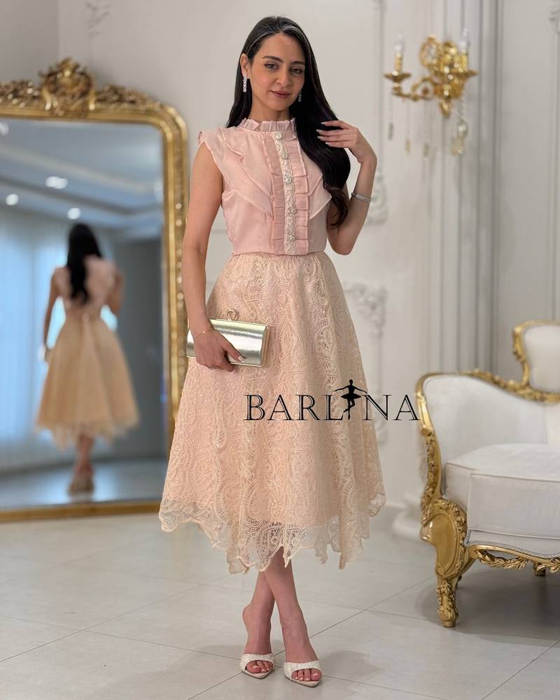 Feminine pink set with a scalloped-edge skirt