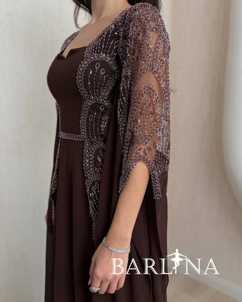 Long brown dress with a sheer cape
