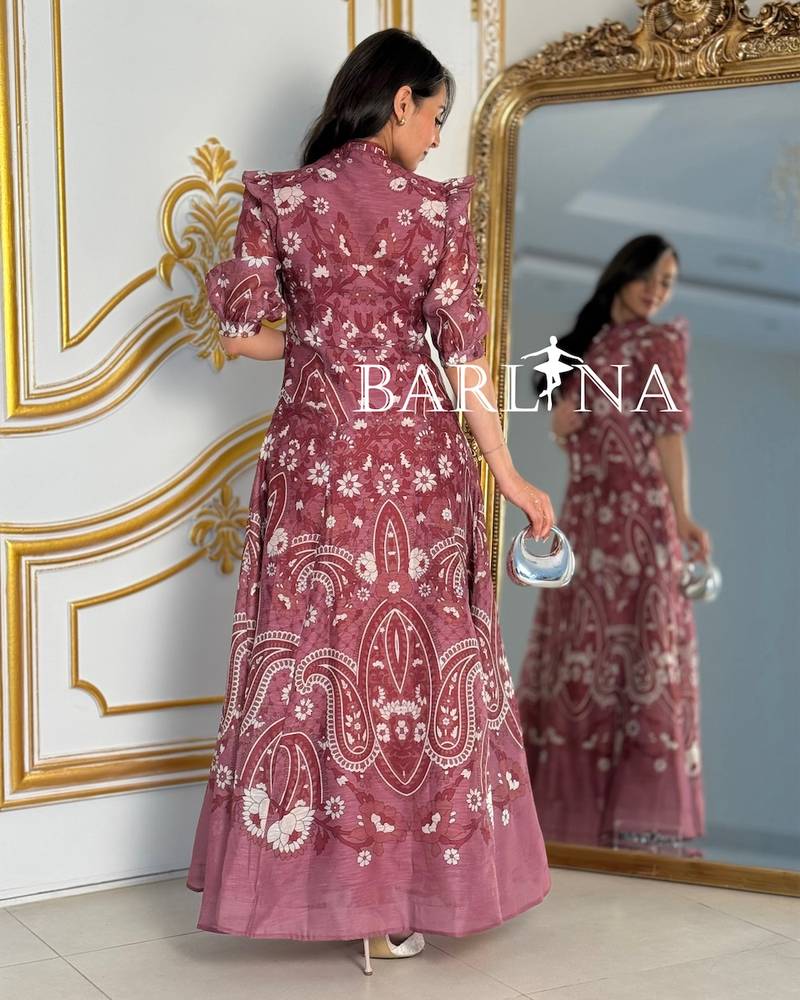 Long pink dress with soft ruffled sleeves