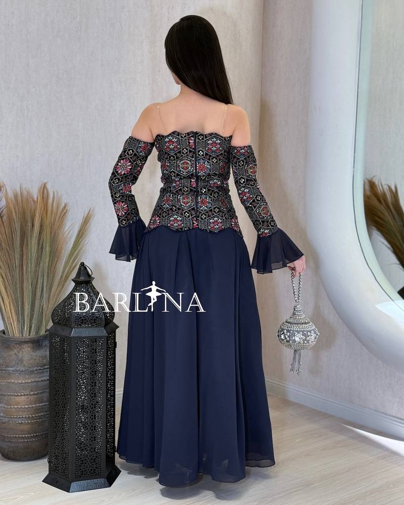 Off-shoulder navy jalabiya with an embroidered top
