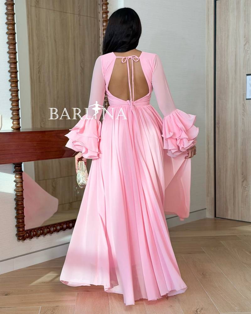 Pink dress with layered sleeves and open back
