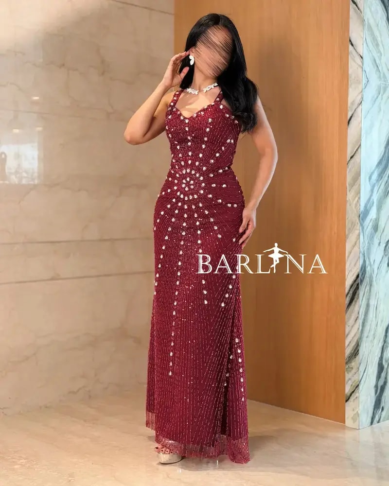 Burgundy skinny evening dress with shimmering embroidery