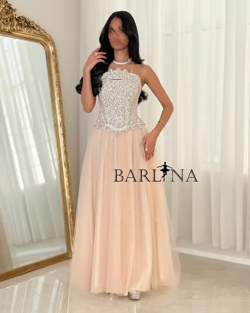 Beige evening dress with embroidered corset