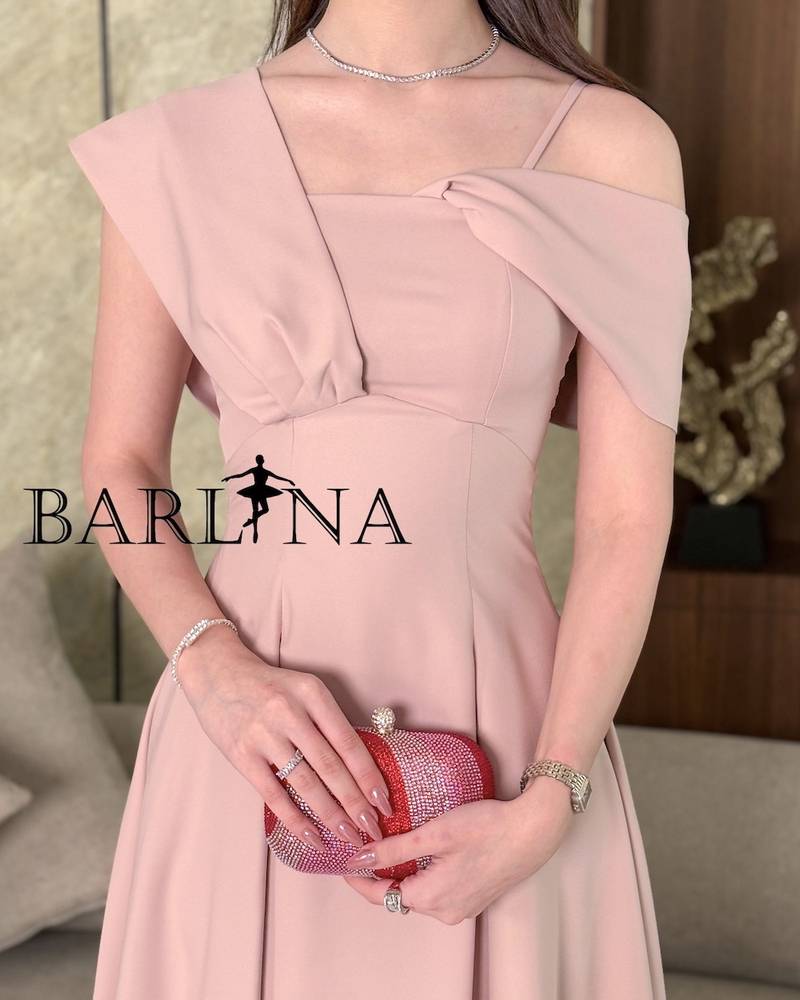 Light pink midi dress with a defined waist