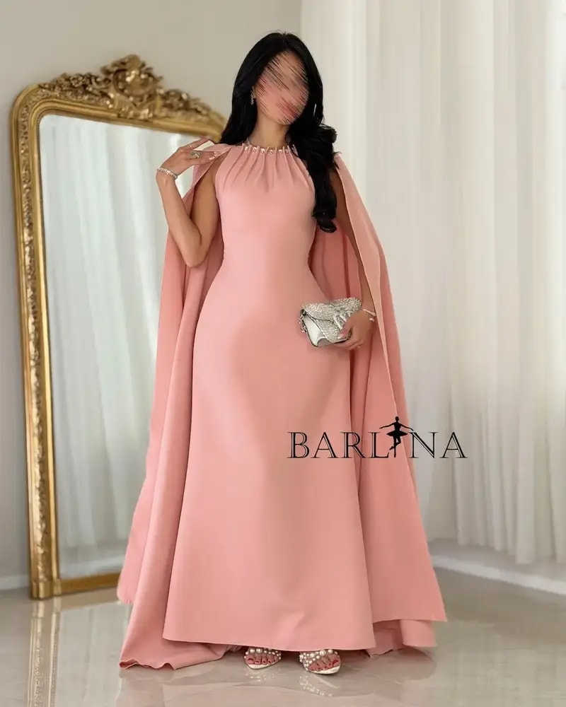 Pink occasion dress with a wide cape