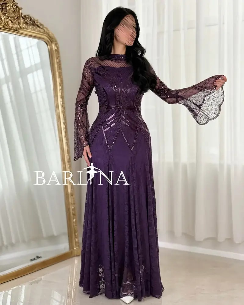 Luxurious purple evening dress with transparent sleeves