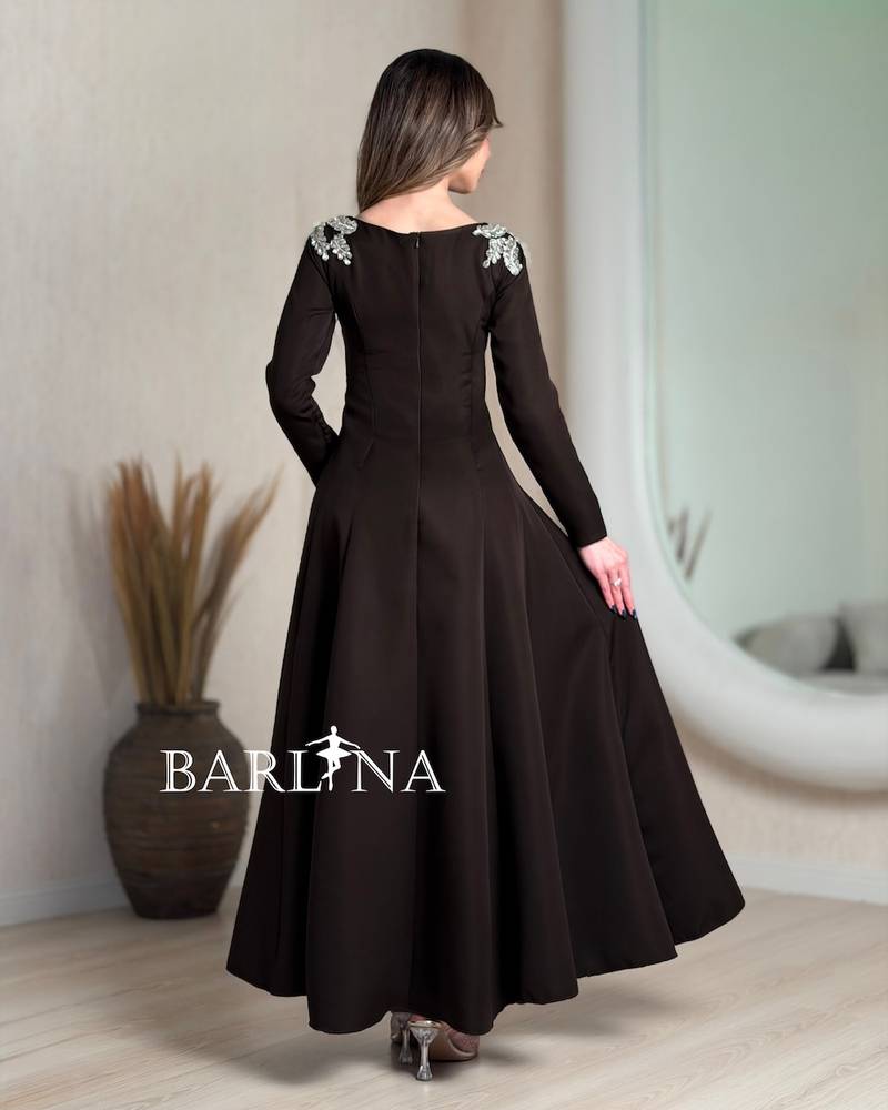 Dark brown dress with embroidery on the shoulders