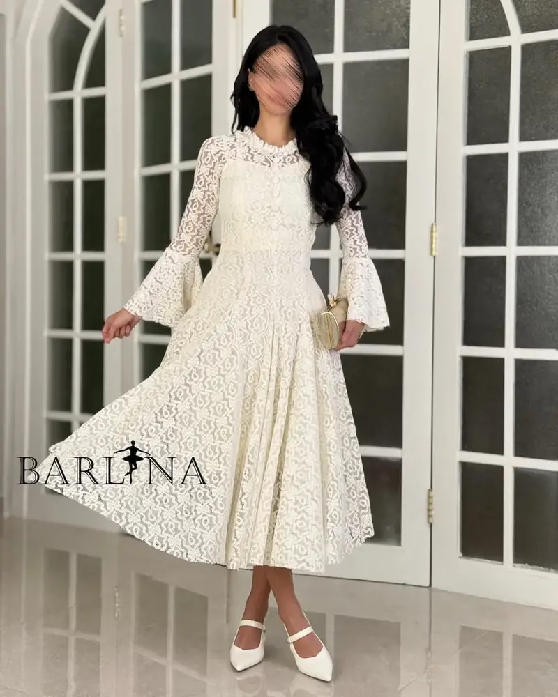A soft dress adorned with elegant lace patterns