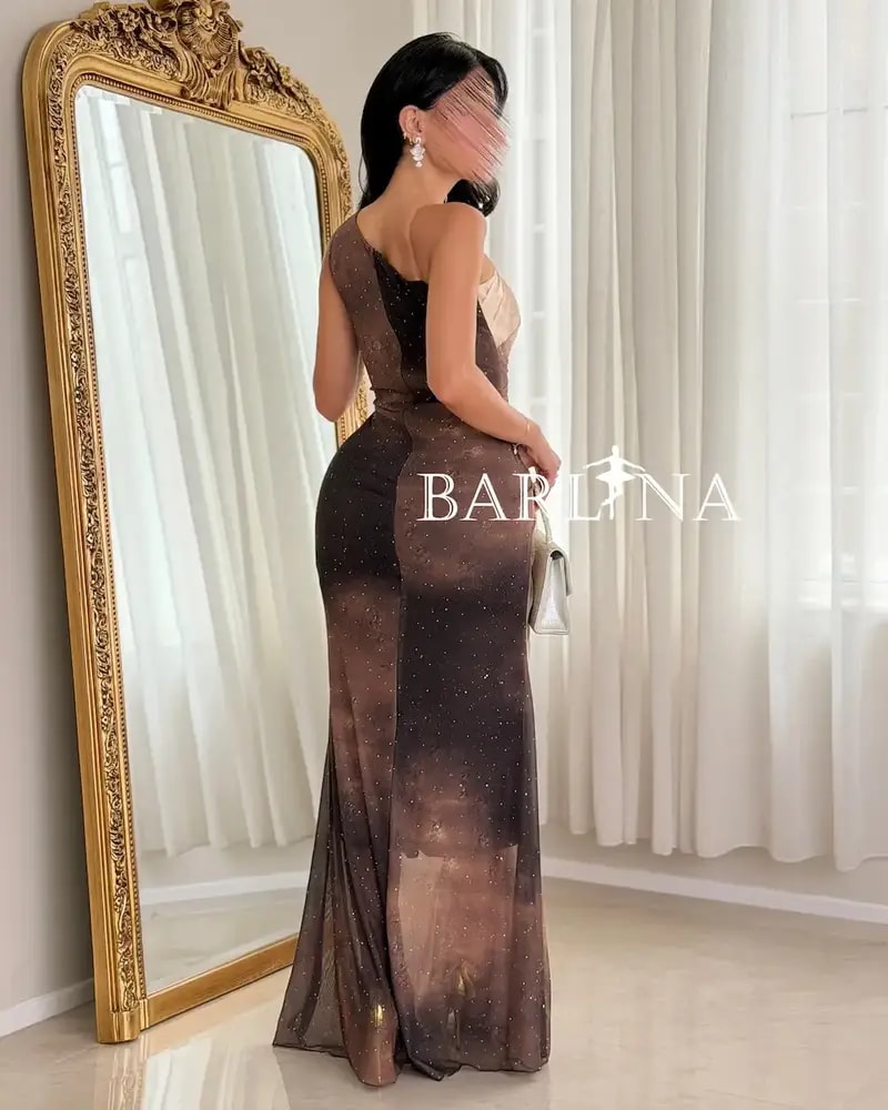 One-shoulder draped dress in gradient colors