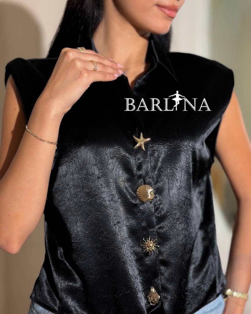 Elegant sleeveless blouse in a shiny color