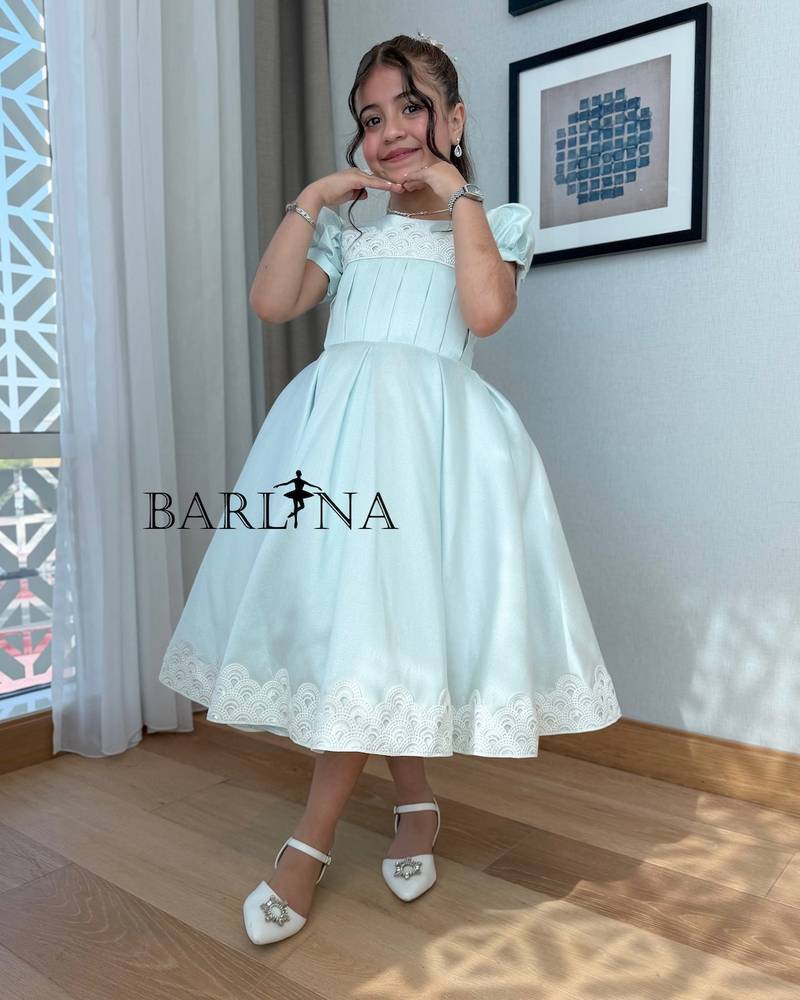 Light blue girly dress adorned with white lace trim