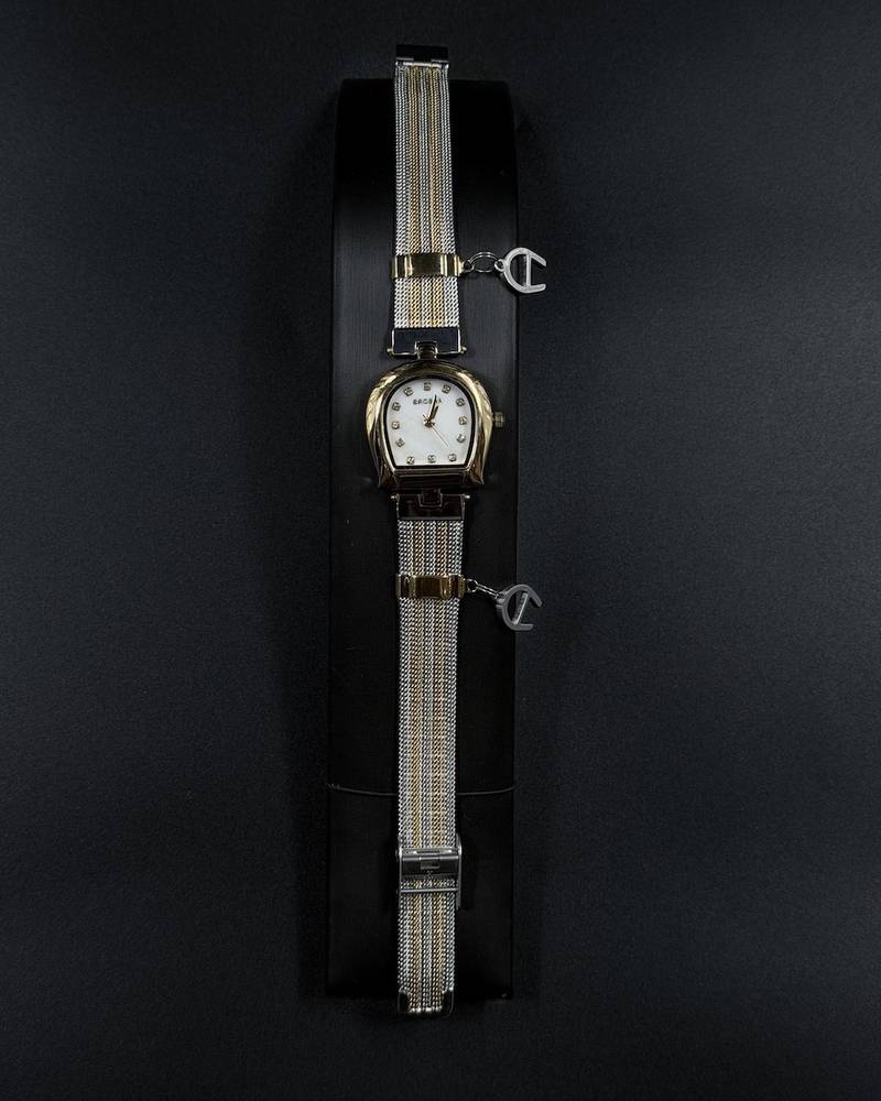 Elegant women's watch adorned with a charm